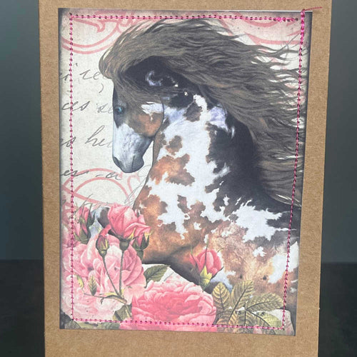 Card with a horse and floral design on a textured background