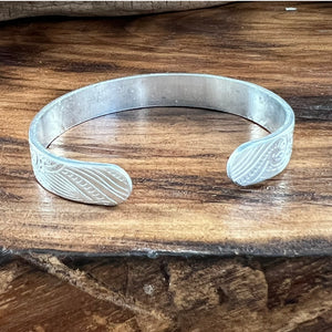 backside of aluminum stamped bracelet