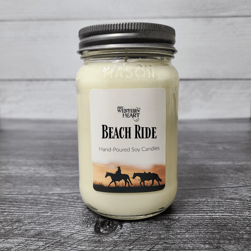 Beach Ride Equestrian Candle has cowgirl with horses