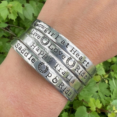 hand stamped bracelets with cowgirl sayings